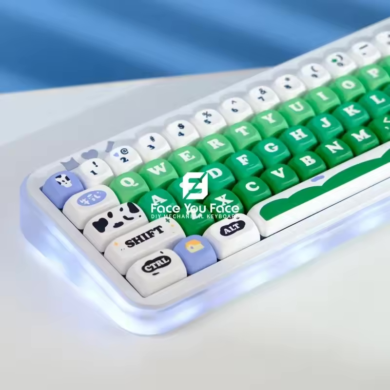 A product photo of a key cap set that resembles a dairy pasture in green and light blue hues.